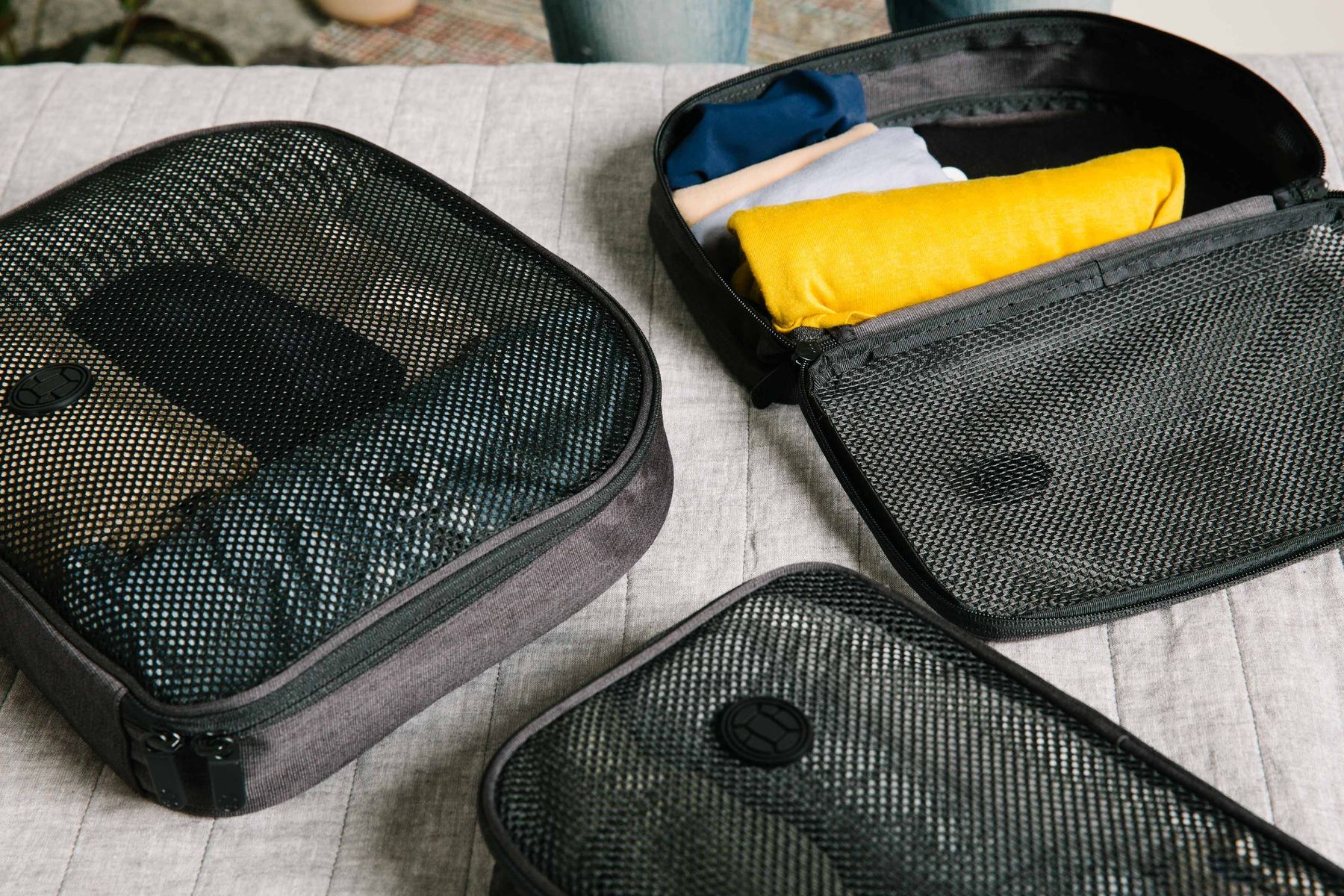Weekend travel packing cubes organized inside a duffel bag